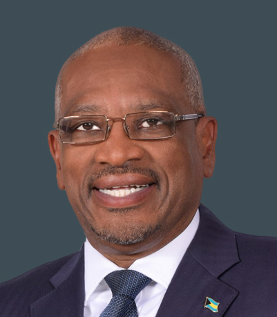 Dr. Hubert Minnis